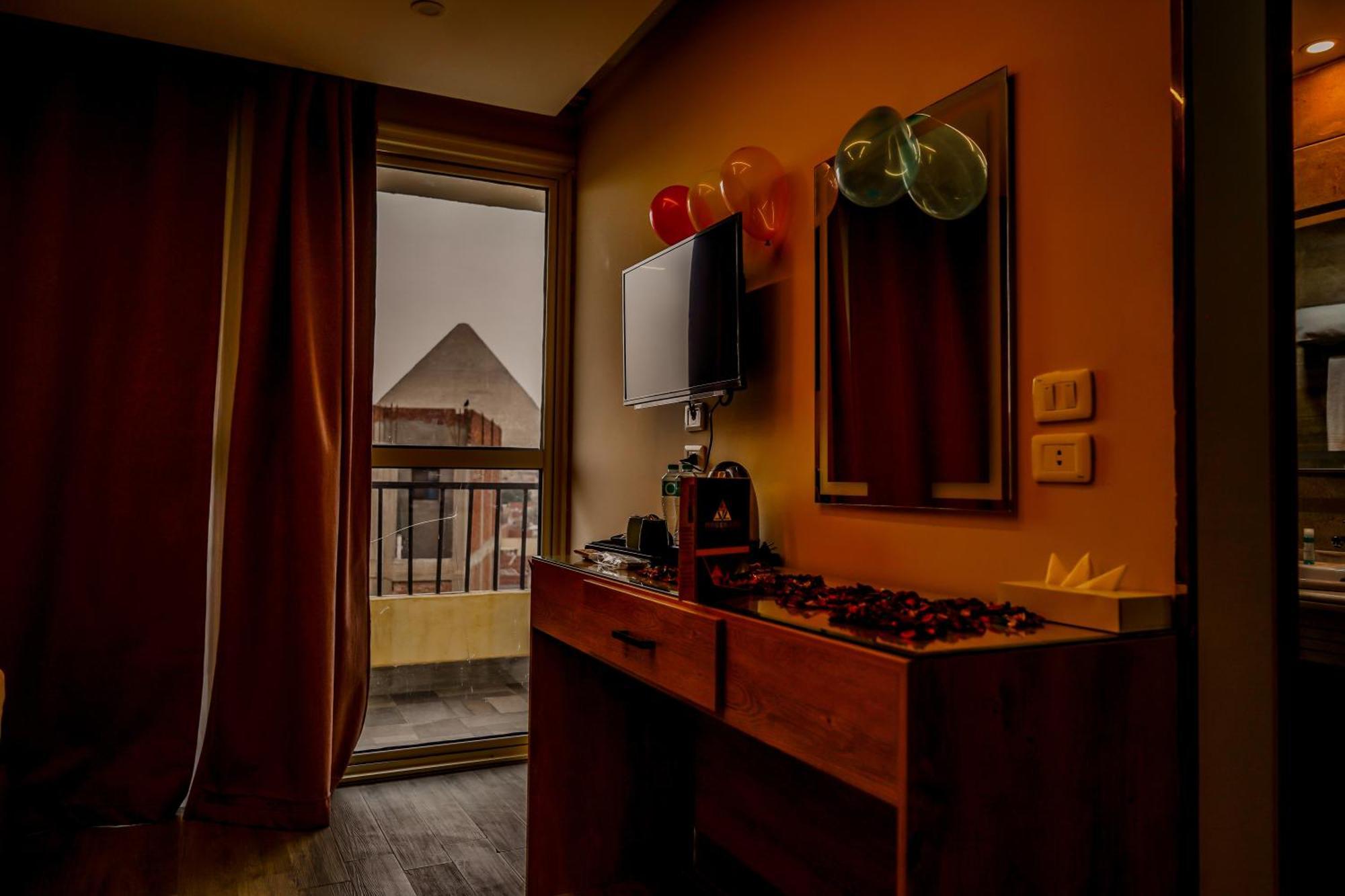 Pyramids Hotel Kafrat al Jabal Bagian luar foto