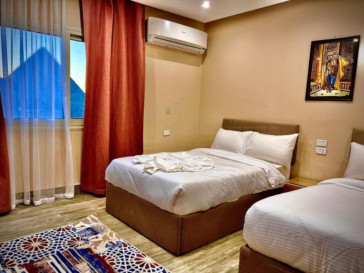 Pyramids Hotel Kafrat al Jabal Bagian luar foto