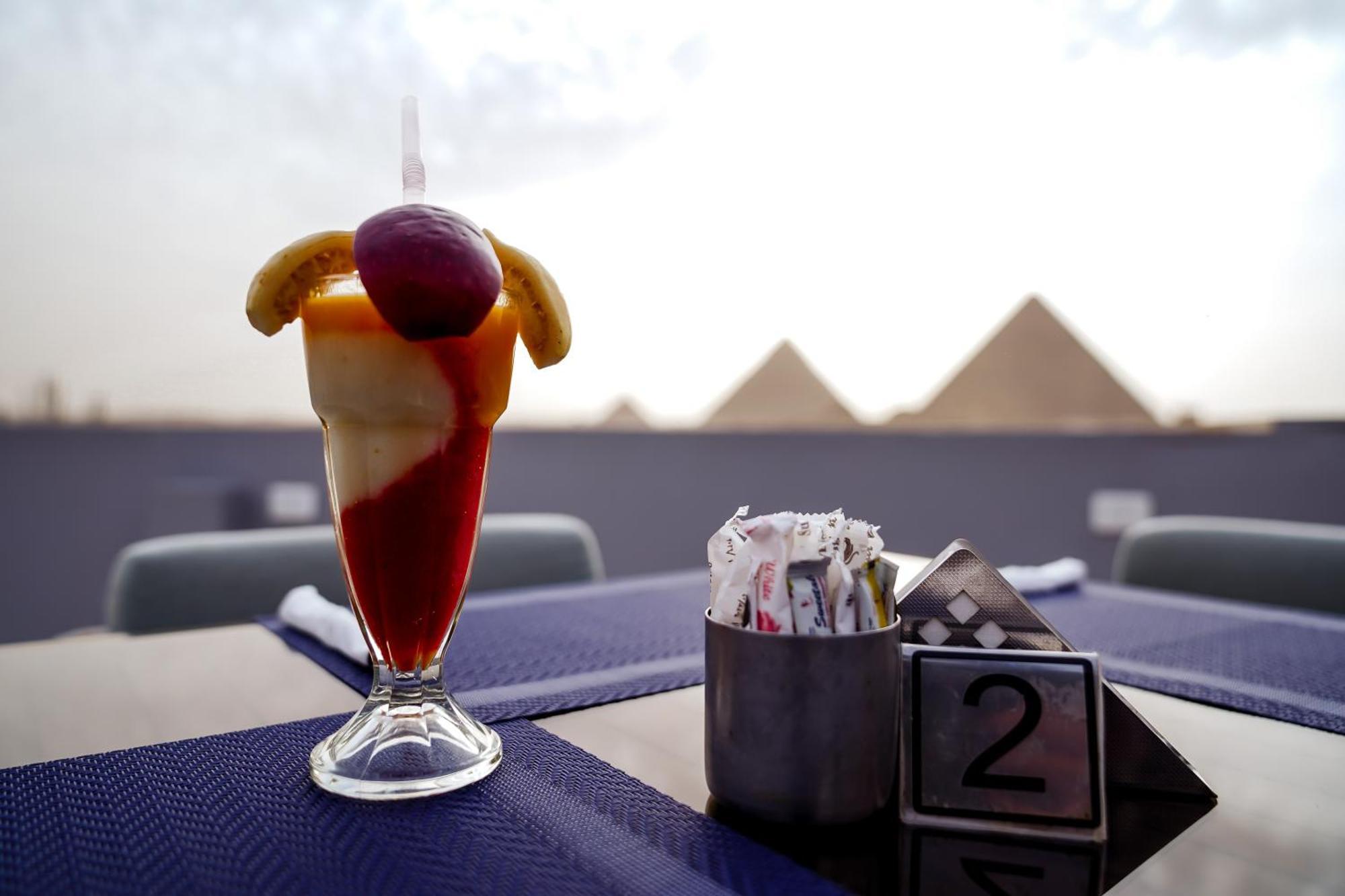 Pyramids Hotel Kafrat al Jabal Bagian luar foto